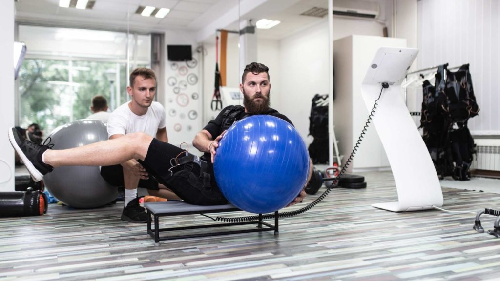Therapy using a yoga ball