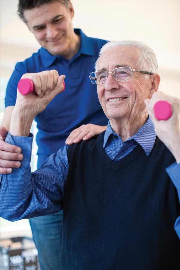 A happy old man doing his therapy