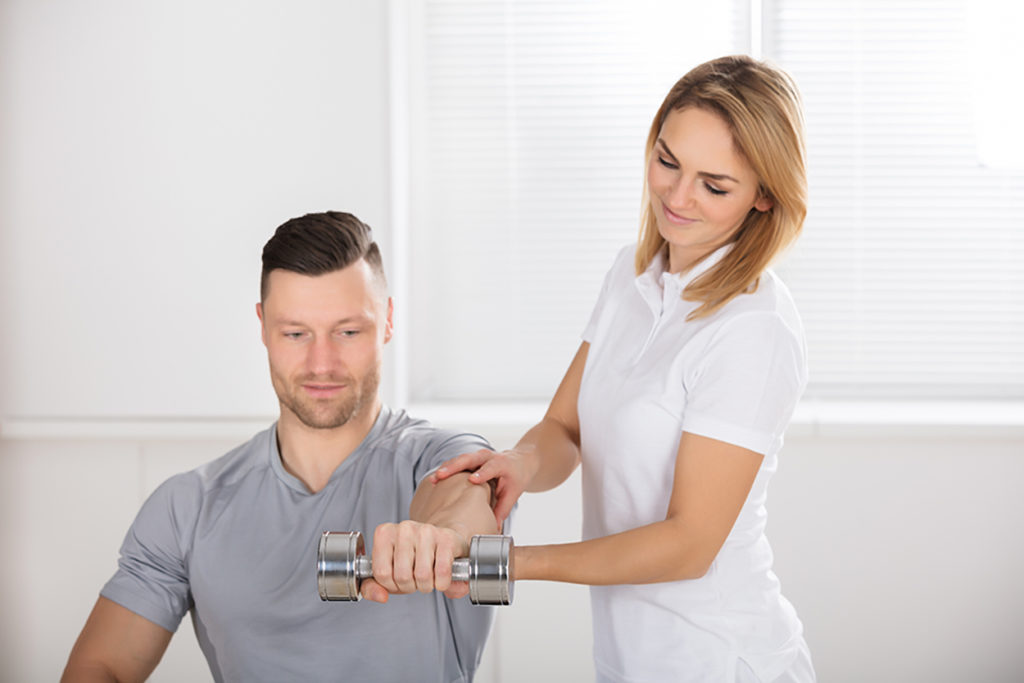 Patient doing arm exercise