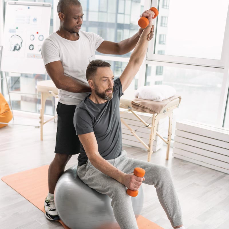 A man doing shoulder therapy